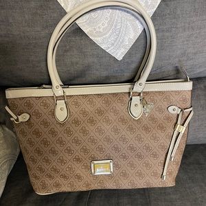 Guess handbag. Tan color. Brand new with tag